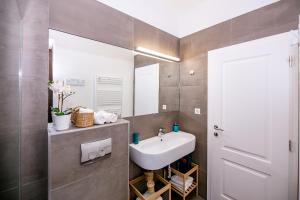 Kúpeľňa v ubytovaní Apartments Bella Fiume + 37 fotografií