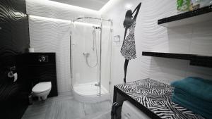 Kúpeľňa v ubytovaní Apartament Delux + 5 fotografií