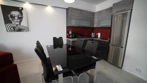 Kuchyňa alebo kuchynka v ubytovaní Apartament Delux