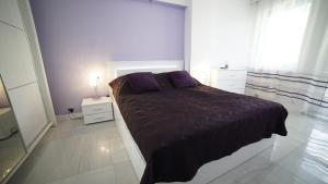 Posteľ alebo postele v izbe v ubytovaní Apartament Delux