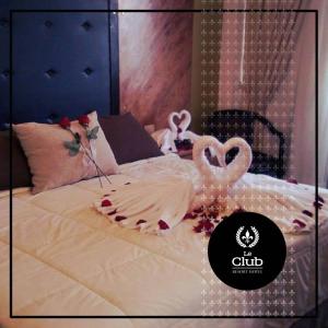 Katil atau katil-katil dalam bilik di leclub resort hotel