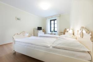 Postelja oz. postelje v sobi nastanitve Hotel Celerin