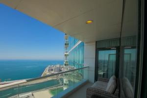 A balcony or terrace at Stunning 5* 4BR-Oceanfront-Apartment