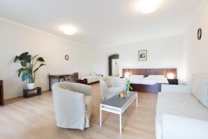 Predel za sedenje v nastanitvi Hotel Celerin