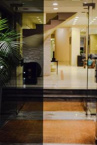 a view of a lobby from a glass door at Hotel Hernandarias in Santa Fe