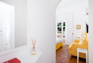 A bed or beds in a room at Hotel Villa Garden