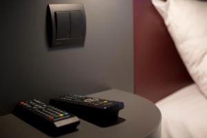 TV a/nebo společenská místnost v ubytování Mape hôtel