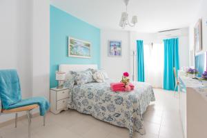 Postel nebo postele na pokoji v ubytování Apartamento Bella Lucia