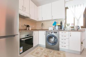 Kuchyň nebo kuchyňský kout v ubytování Apartamento Bella Lucia