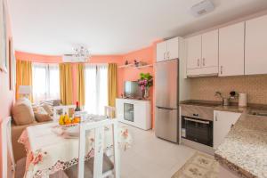 Kuchyň nebo kuchyňský kout v ubytování Apartamento Bella Lucia