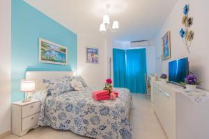 Postel nebo postele na pokoji v ubytování Apartamento Bella Lucia