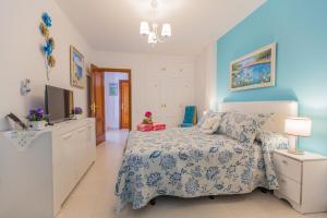 Postel nebo postele na pokoji v ubytování Apartamento Bella Lucia