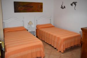 A bed or beds in a room at Tramuntana 37, 1°