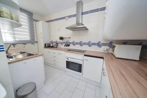 Kuchnia lub aneks kuchenny w obiekcie Bajamar 13, vistas desde la azotea, wifi gratis