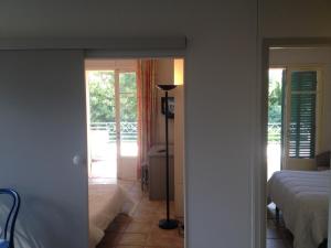Postel nebo postele na pokoji v ubytování Hôtel De La Mer