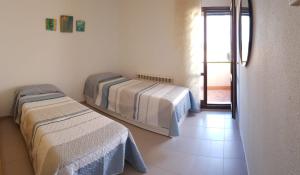 Un pat sau paturi într-o cameră la CASA RURAL CASCO ANTIGUO