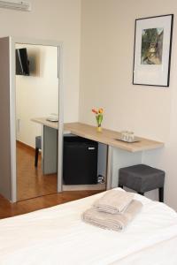 A television and/or entertainment centre at Polus Pension