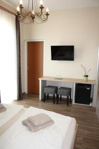 A television and/or entertainment centre at Polus Pension