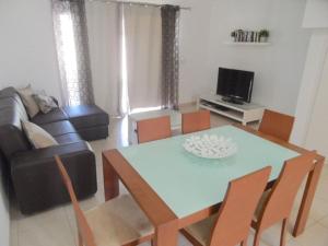 Posezení v ubytování DUPLEX C7 con PISCINA PRIVADA