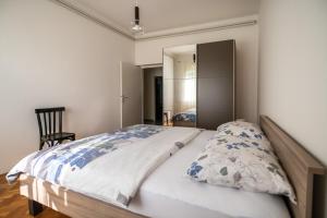 Postel nebo postele na pokoji v ubytování Apartment Nono
