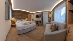 Giường trong phòng chung tại Hotel Garni Glockenstuhl