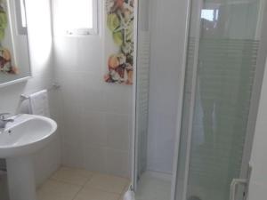 Koupelna v ubytování DUPLEX C7 con PISCINA PRIVADA