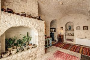 Postel nebo postele na pokoji v ubytování Masseria Cervarolo