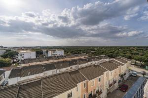 an overhead view of a building with solar panels on it at Hotel Carabela Santa María in Mazagón
