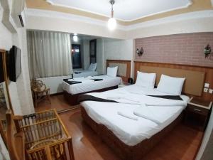 Postel nebo postele na pokoji v ubytování Istanbul Sydney Hotel