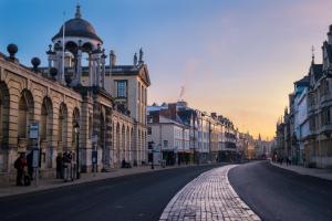 an empty street in a city with buildings at 2 bed 2 bath at Pelican Hse in Newbury - FREE secure, allocated parking in Newbury