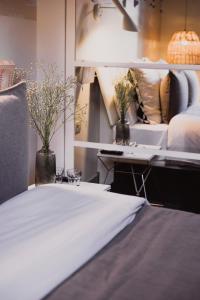 a bedroom with a bed and a desk with aaptop at room Select Sol in Madrid