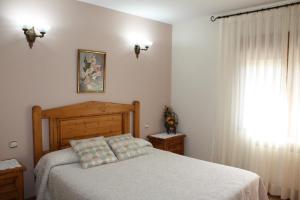 Raco del Tosca tesisinde bir odada yatak veya yataklar