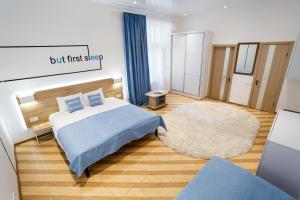 Postel nebo postele na pokoji v ubytování Discovery Hotel
