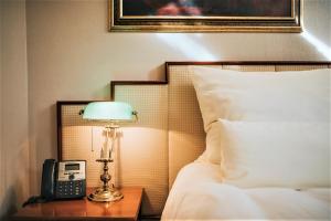 Llit o llits en una habitació de Hotel Mitra, Story Hotels