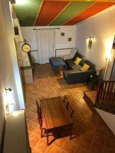 a living room with a couch and a table at Casa Rural Coripe in Coripe