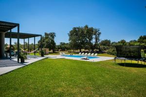 The swimming pool at or close to Villa Katrin Walking Distance to Beach