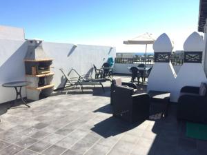 Fotografia z galérie ubytovania DARUMA APARTMENTS 3-Bedroom Penthouse with Sea Views v destinácii Costa Teguise
