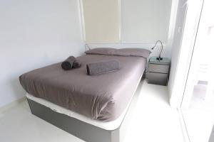 Posteľ alebo postele v izbe v ubytovaní DARUMA APARTMENTS 3-Bedroom Penthouse with Sea Views