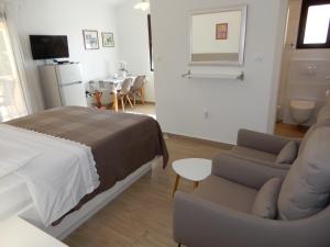 TV a/nebo společenská místnost v ubytování Apartments Simicev