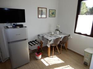 Kuchyň nebo kuchyňský kout v ubytování Apartments Simicev