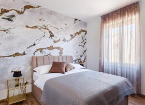 Posteľ alebo postele v izbe v ubytovaní Cozy Apartment Lile in the heart of old town Split