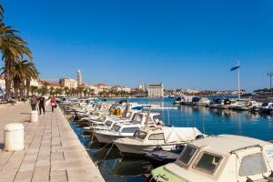a bunch of boats are docked in a harbor at New luxury apartment Nives on seaside in Split