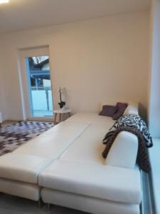 Postel nebo postele na pokoji v ubytování Gemütliches 3 Zimmer Apartment nahe Graz