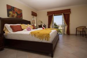 Een bed of bedden in een kamer bij Casa Bela Vista