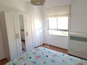 Posteľ alebo postele v izbe v ubytovaní Fantástico apartamento en la playa