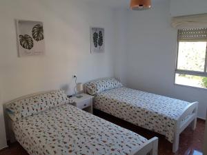 Posteľ alebo postele v izbe v ubytovaní Fantástico apartamento en la playa