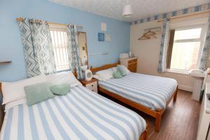 Postel nebo postele na pokoji v ubytování The Osprey Hotel + 95 fotografií