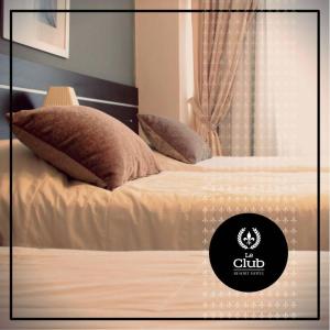 Katil atau katil-katil dalam bilik di leclub resort hotel