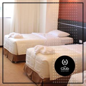Katil atau katil-katil dalam bilik di leclub resort hotel