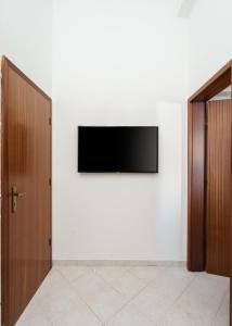 TV a/nebo společenská místnost v ubytování Sunrise Apartment I